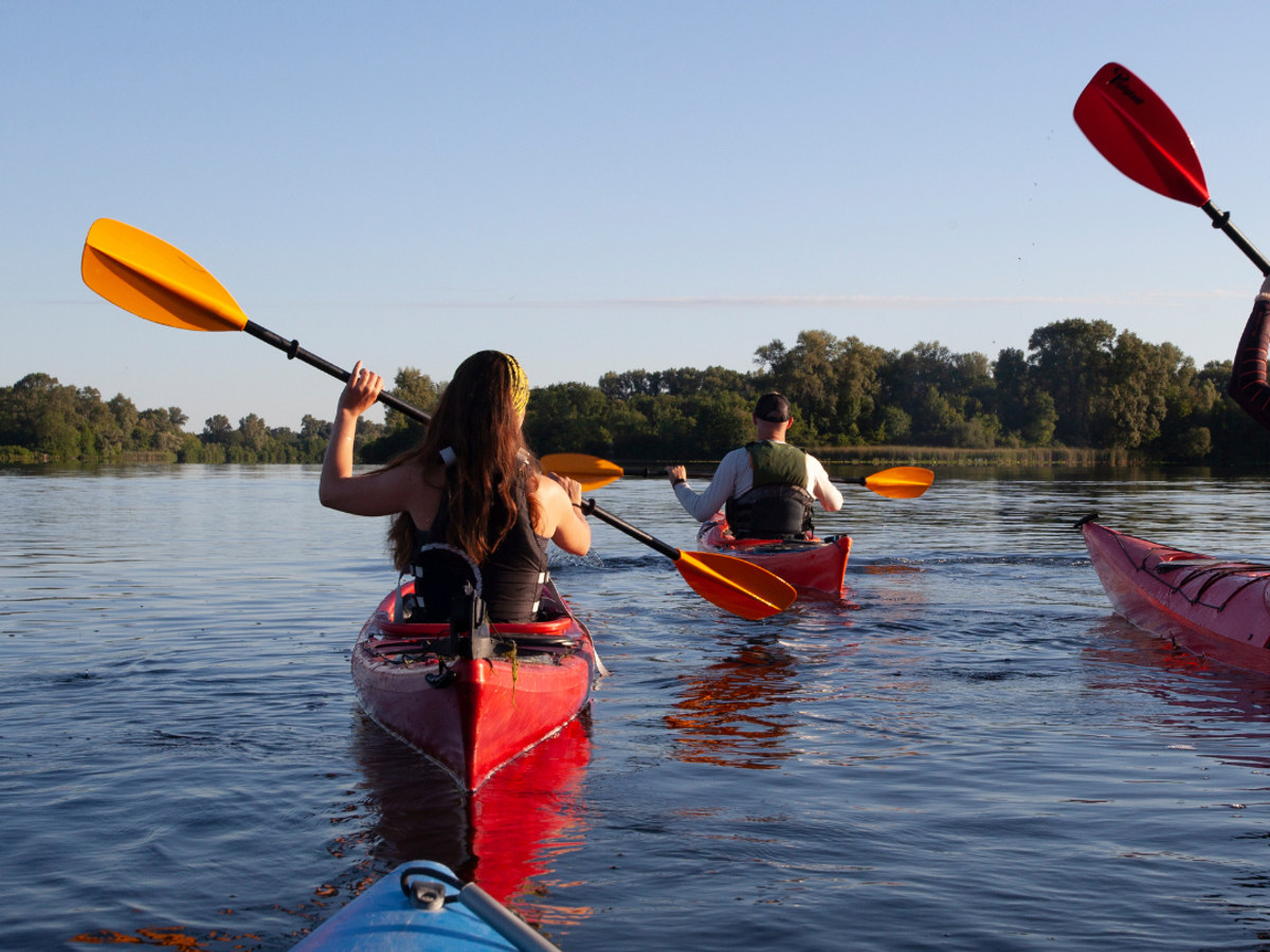 Kayaks on calm water